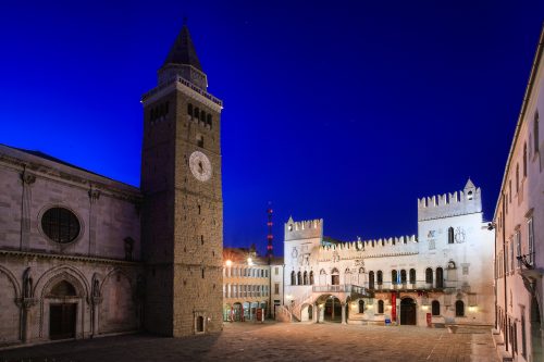 Koper Cathedral in Slovenia, seen here at dusk, houses an altarpiece by Venetian master, Carpaccio.