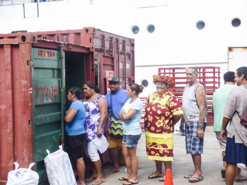 Locals collecting smaller deliveries on the island of Ua Pou in the Marquesas Islands, French Polynesia after Aranui 3 cruise cargo ship docks