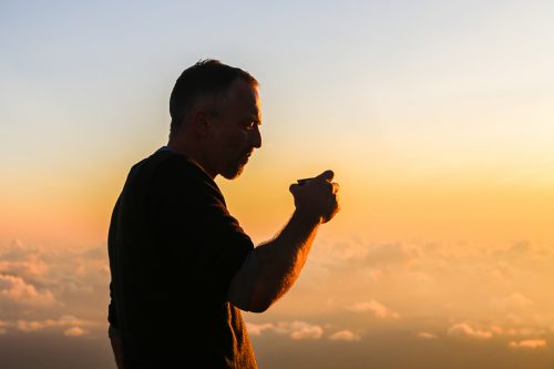 Matt Prior, head of Adventure Academy, enjoying a drink at sunset.