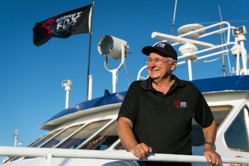 Rodney Fox aboard one of their cage diving expedition boats.