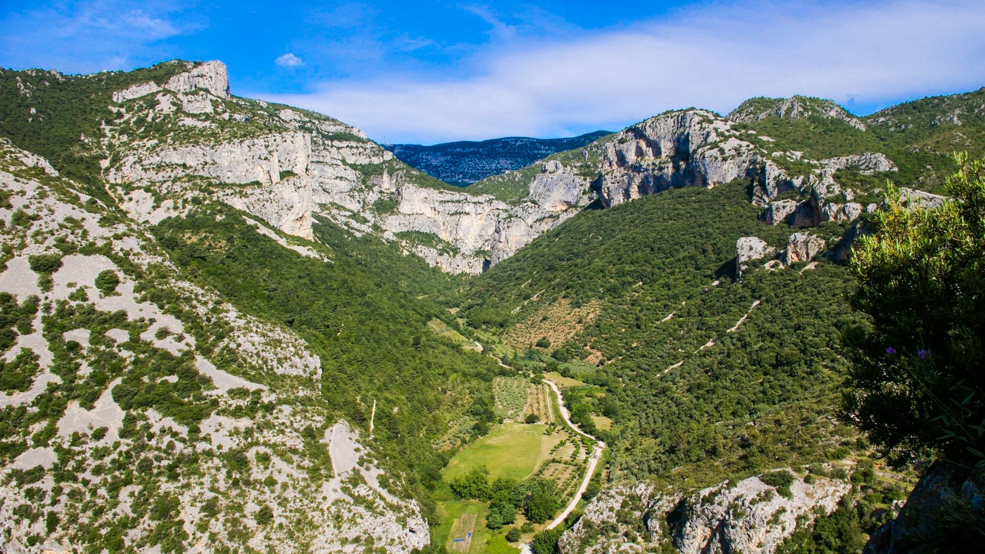 Aerial view of green mountains in the Vallée de l'Hérault: kayaking in France