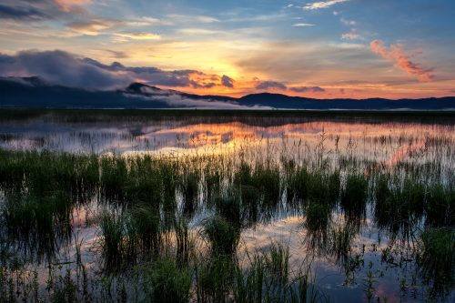 Lake Cerknica in Slovenia, when viewed with water in it at dusk.