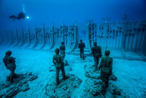 One of the pieces (Crossing the rubicon) in the underwater sculptural piece known as Vicissitudes by British artist Jason deCaires Taylor.