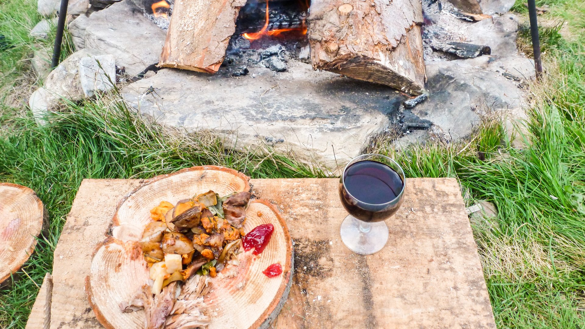 Experiencing nature: Enjoying pit-roasted meal by campfire, Prehistoric Cookery