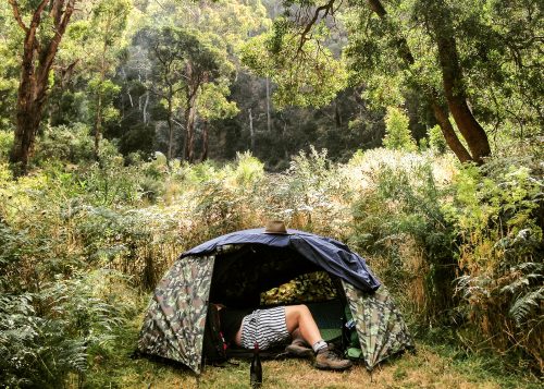 A man camps in the Australian outback