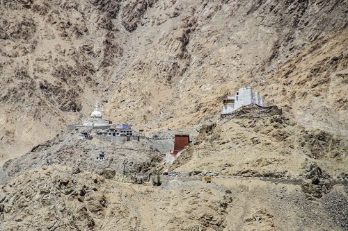 Buildings nestled in the mountainous terrain of the Indus Valley, Ladakh in the Himalayas.
