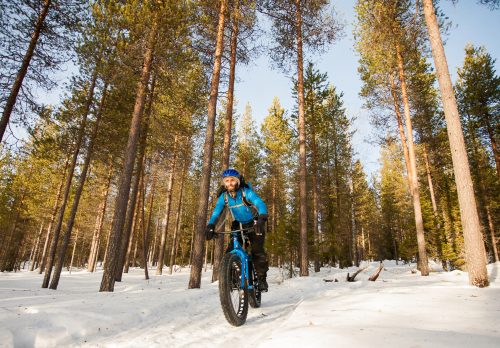 Travel writer James Stewart fat biking in Finland.