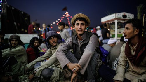 A group of Sufis take a rest during the mawlid of Al-Sayed Al-Badawy in Tanta city, Egypt.