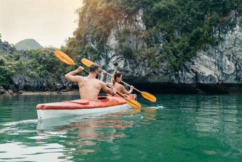 Two kayakers in Halong Bay, Vietnam