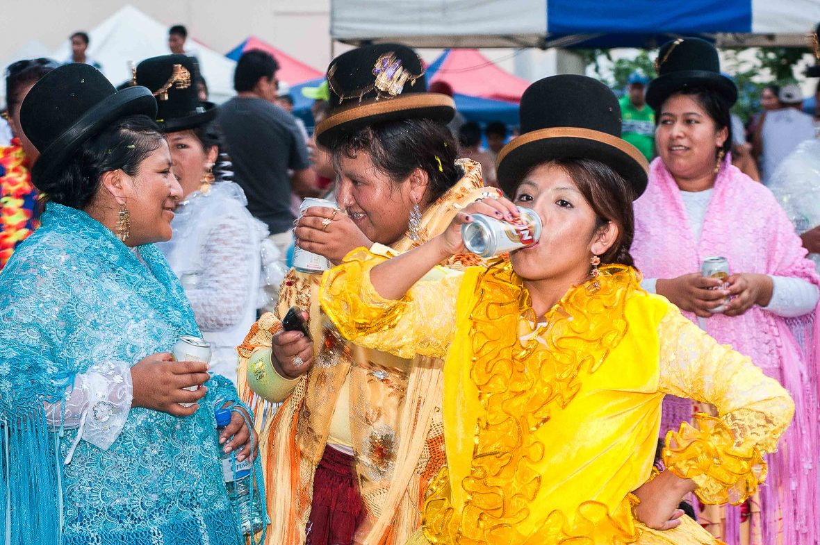 Bolivian women drink beer