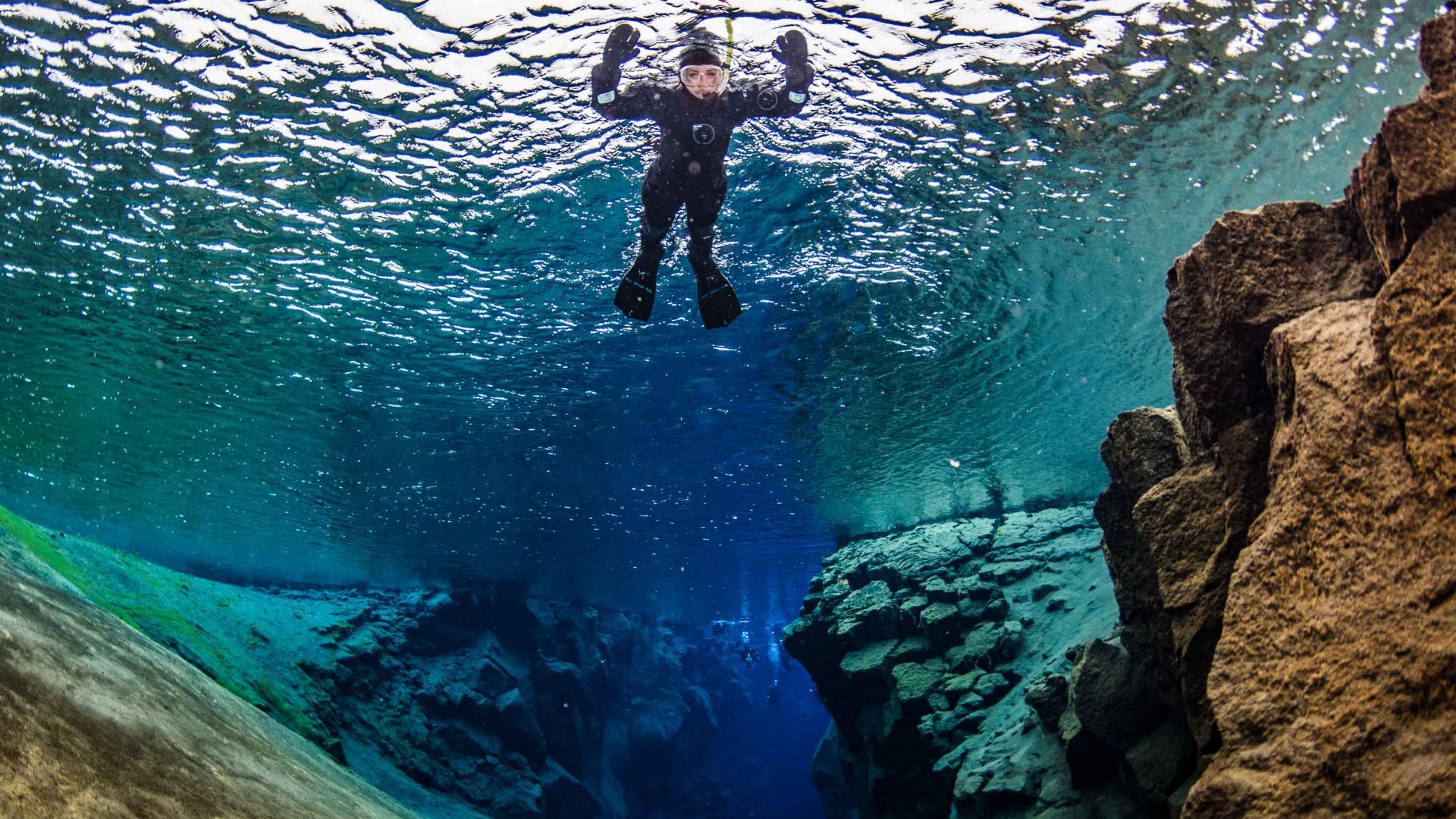 Floating above the Silfra fissure in Iceland.