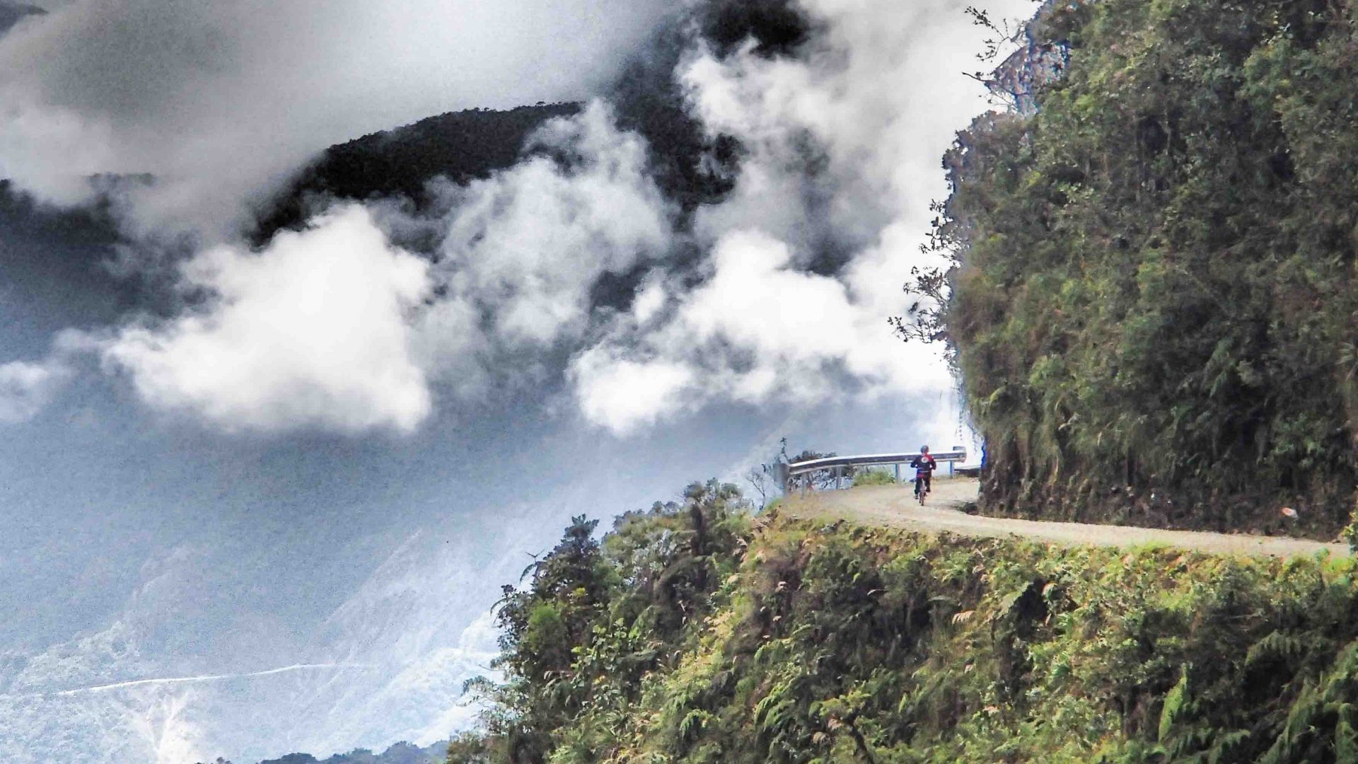 A cyclist tackles the awe-inspiring and fear-inducing terrain of Bolivia's Death Road.