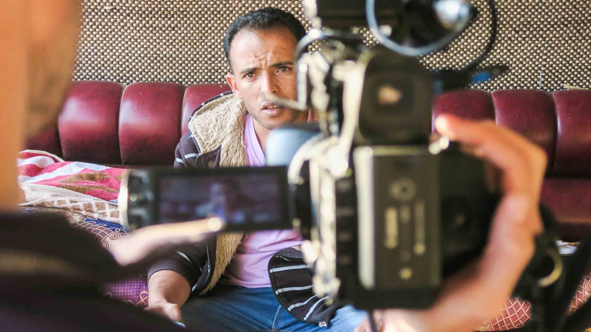 Leon filming a Bedouin person in the West Bank.