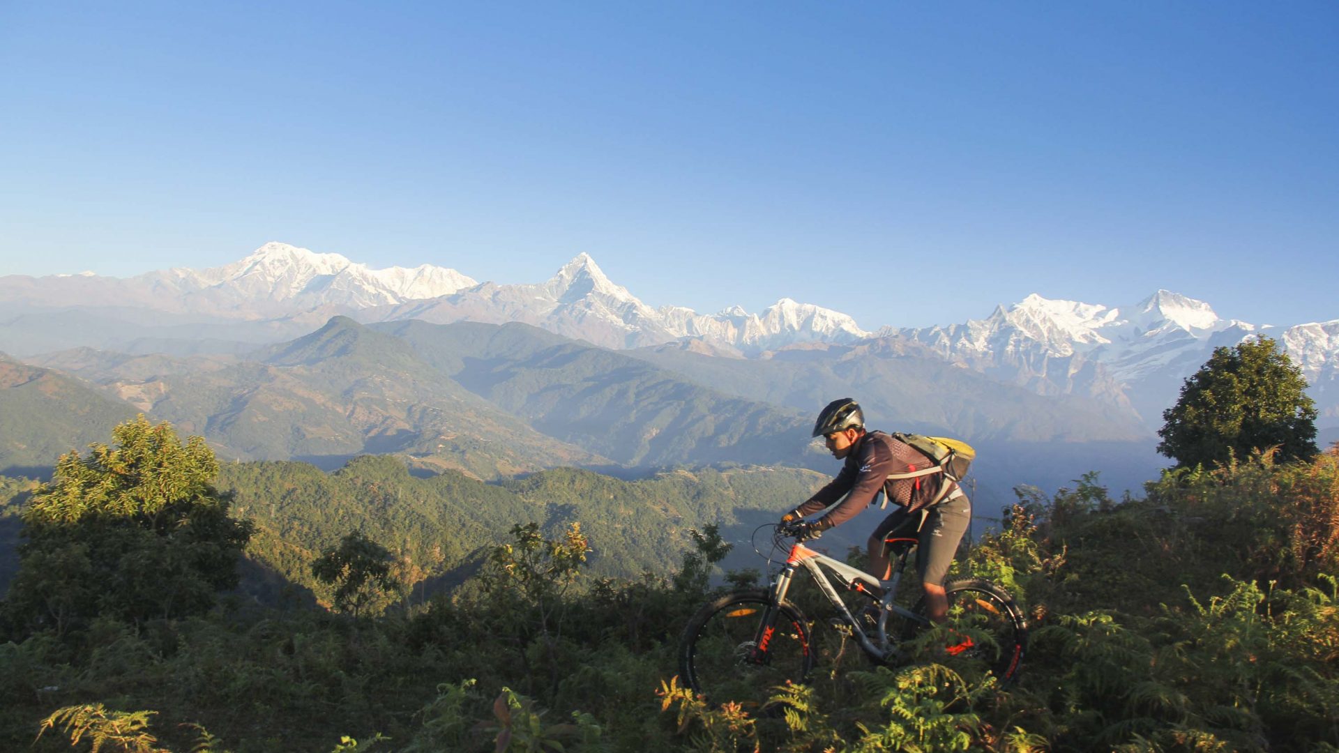 Biking in Nepal's stunning Himalayan Mountain Range.