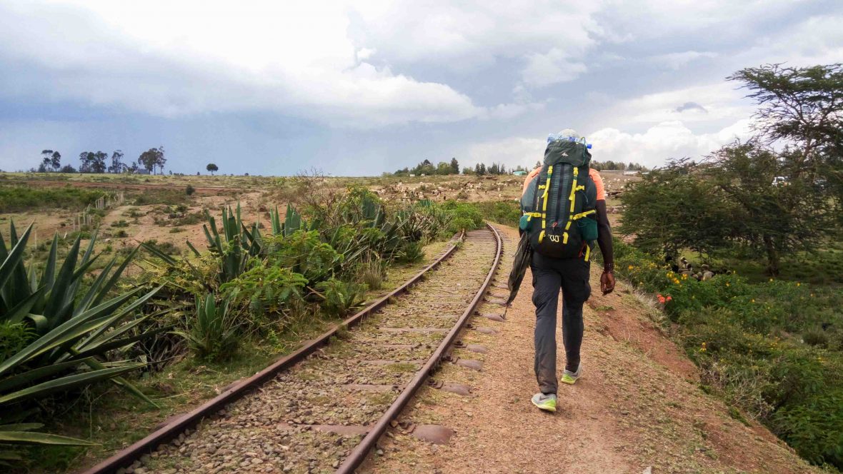 Mario Rigby walking in Kenya.