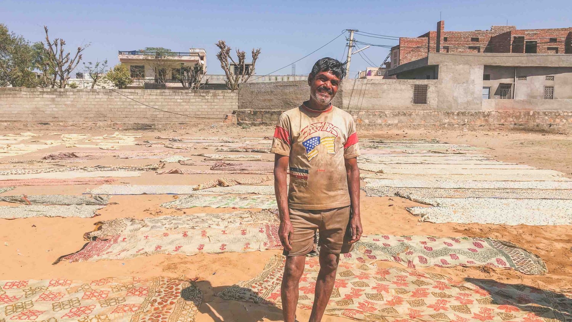 Babu Lal Dobhi, the elder of a washing family in Bagru's drying fields, Rjasthan, India.