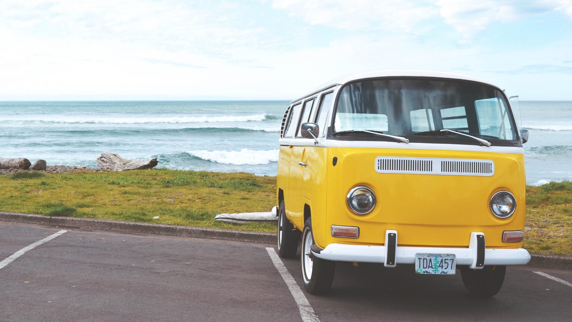 A van is parked at the seaside in the USA.