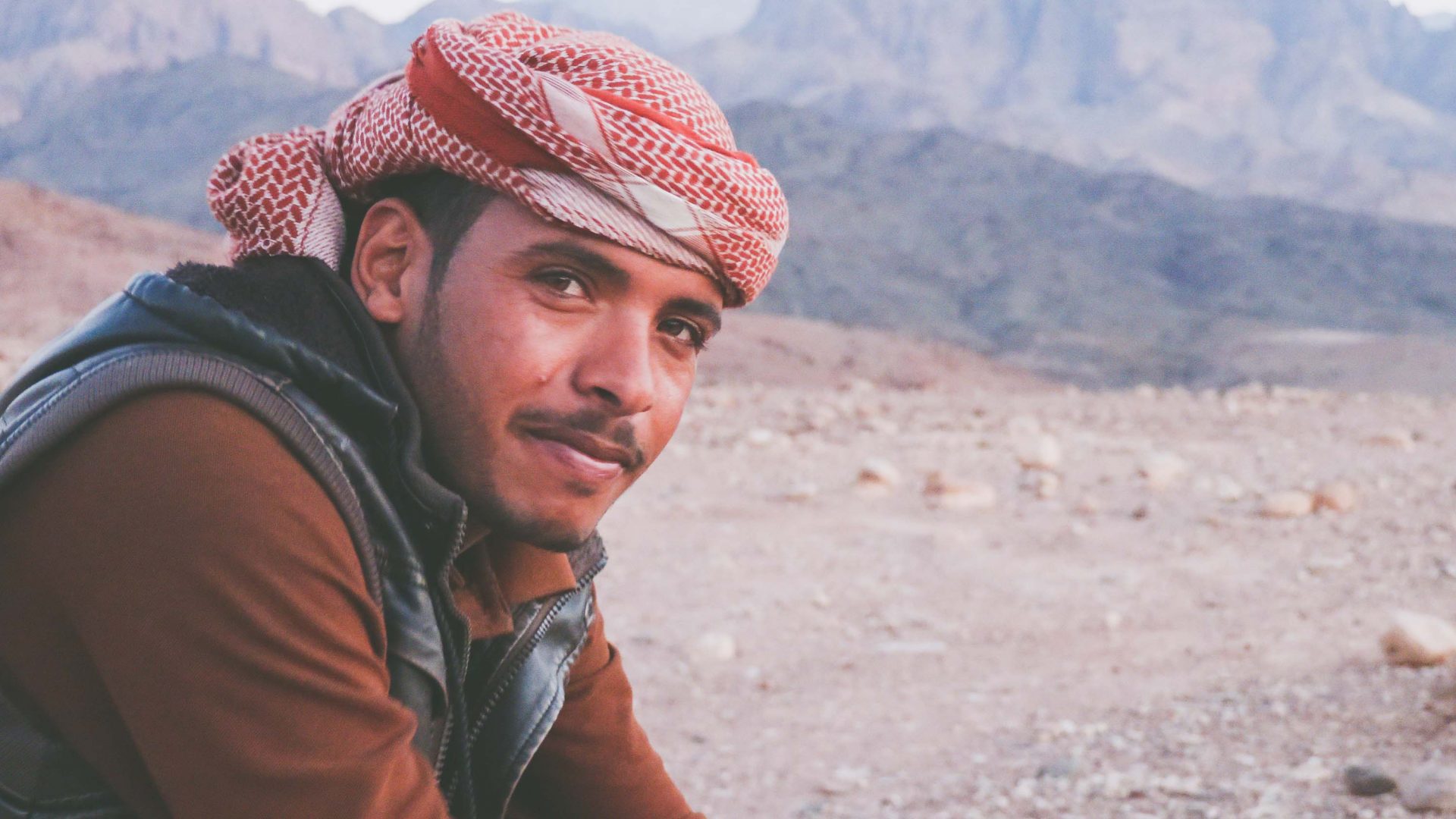 A young Bedouin called Faisal in Wadi Feynan, southern Jordan, chats to Leon McCarron.