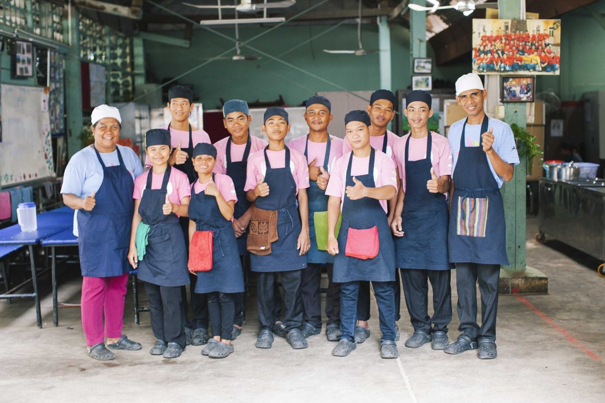 Trainees at a Friends-International-funded restaurant that works to improve the lives of street-living and working children through vocational training.