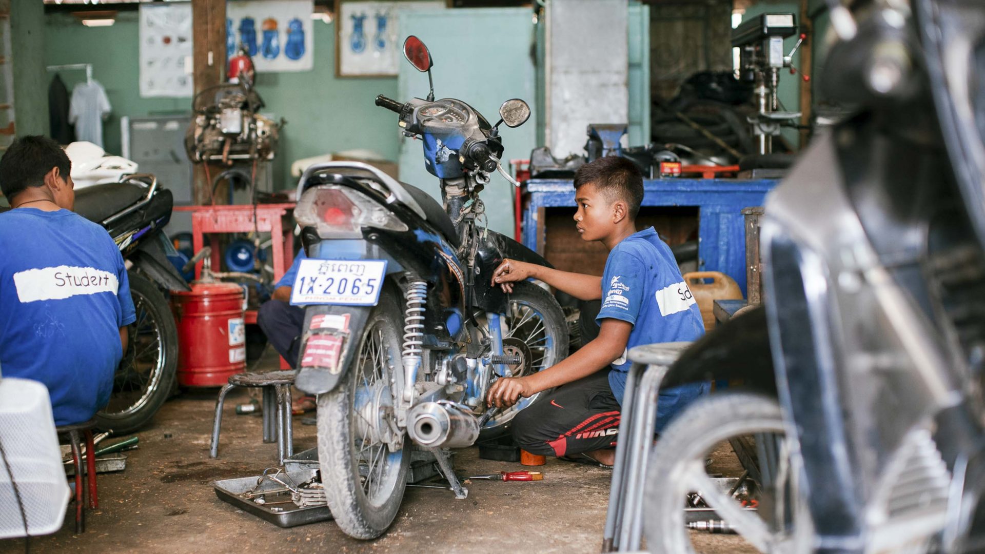Friends-International is helping to improve the lives of street-living and working children through vocational training, including motorcycle mechanic training.