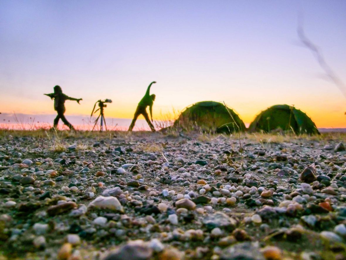 Stretching at the end of a day in the Gobi Desert.