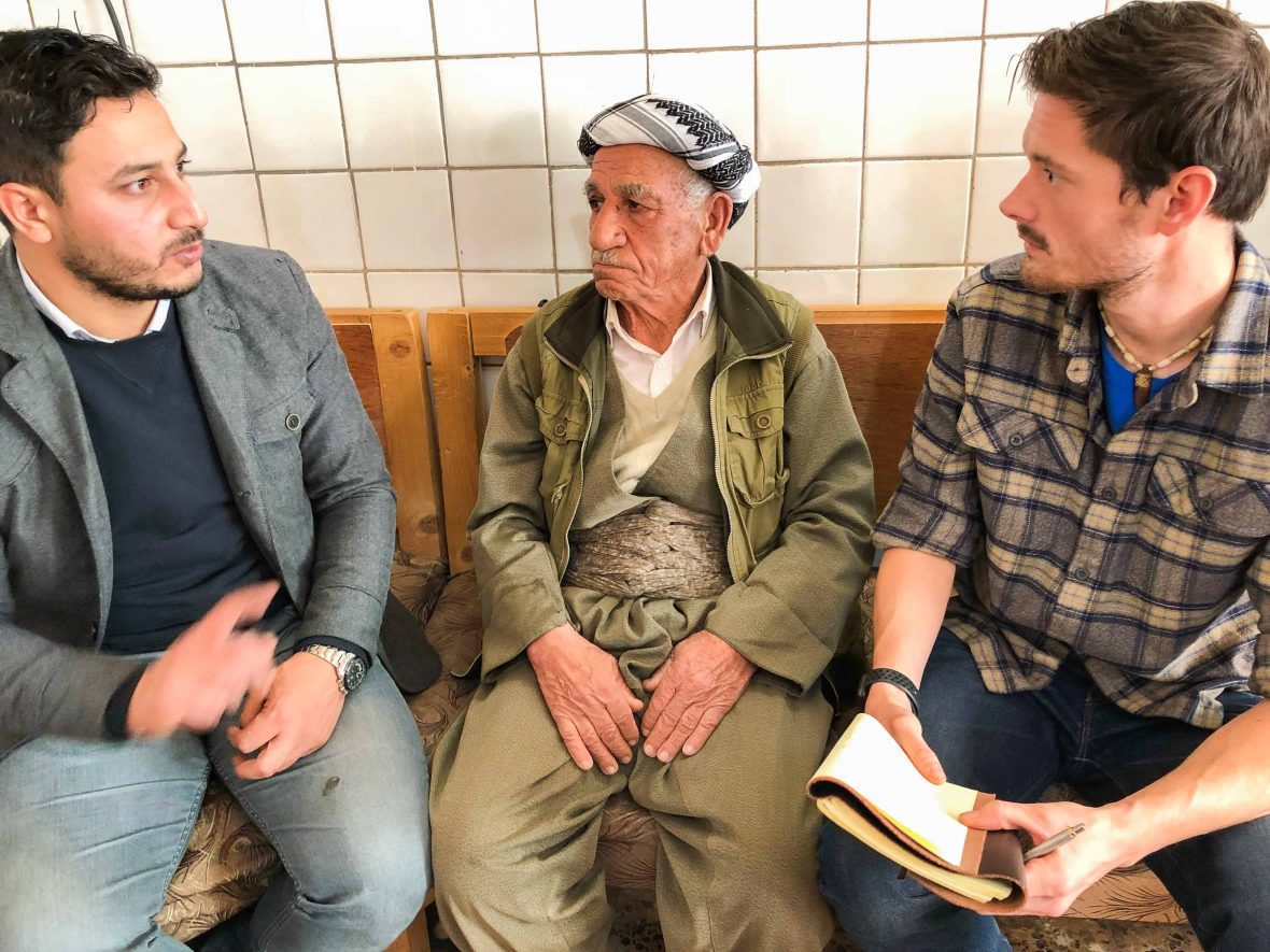 Leon (right) noting down conversations in Iraqi Kurdistan.