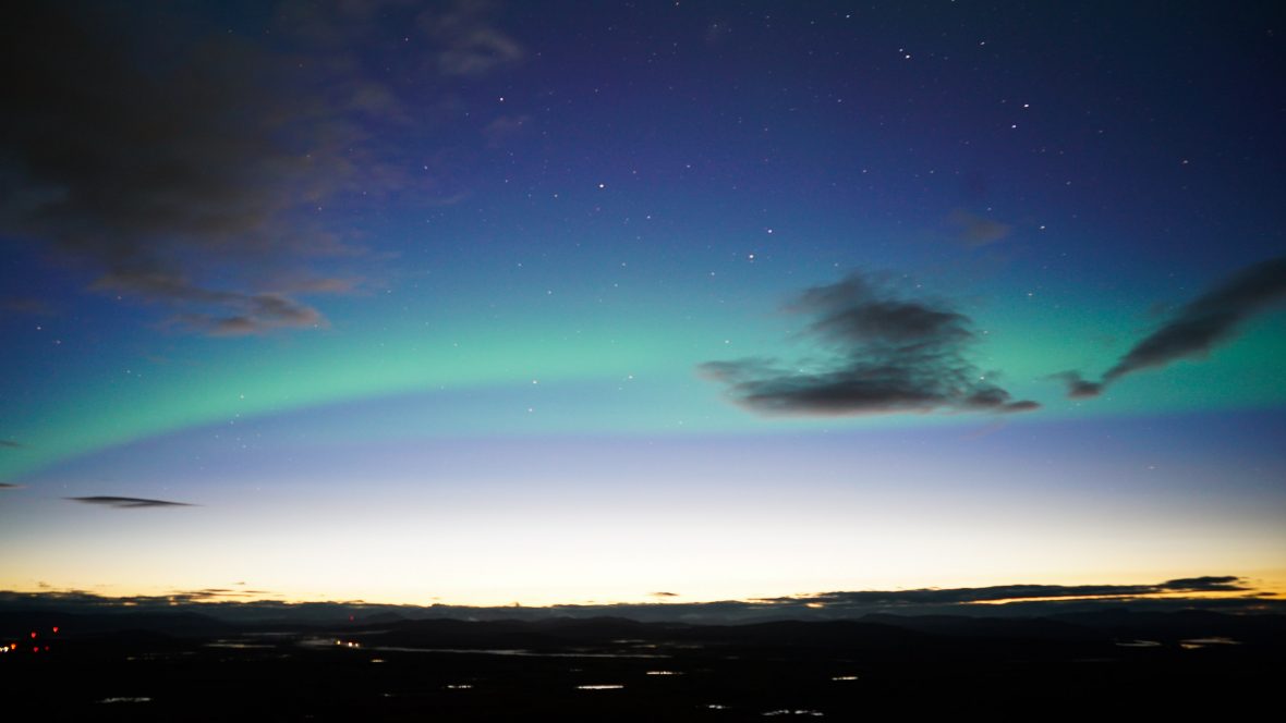 Experiencing the northern lights with Sámi man Lennart near Gällivare, Swedish Lapland.