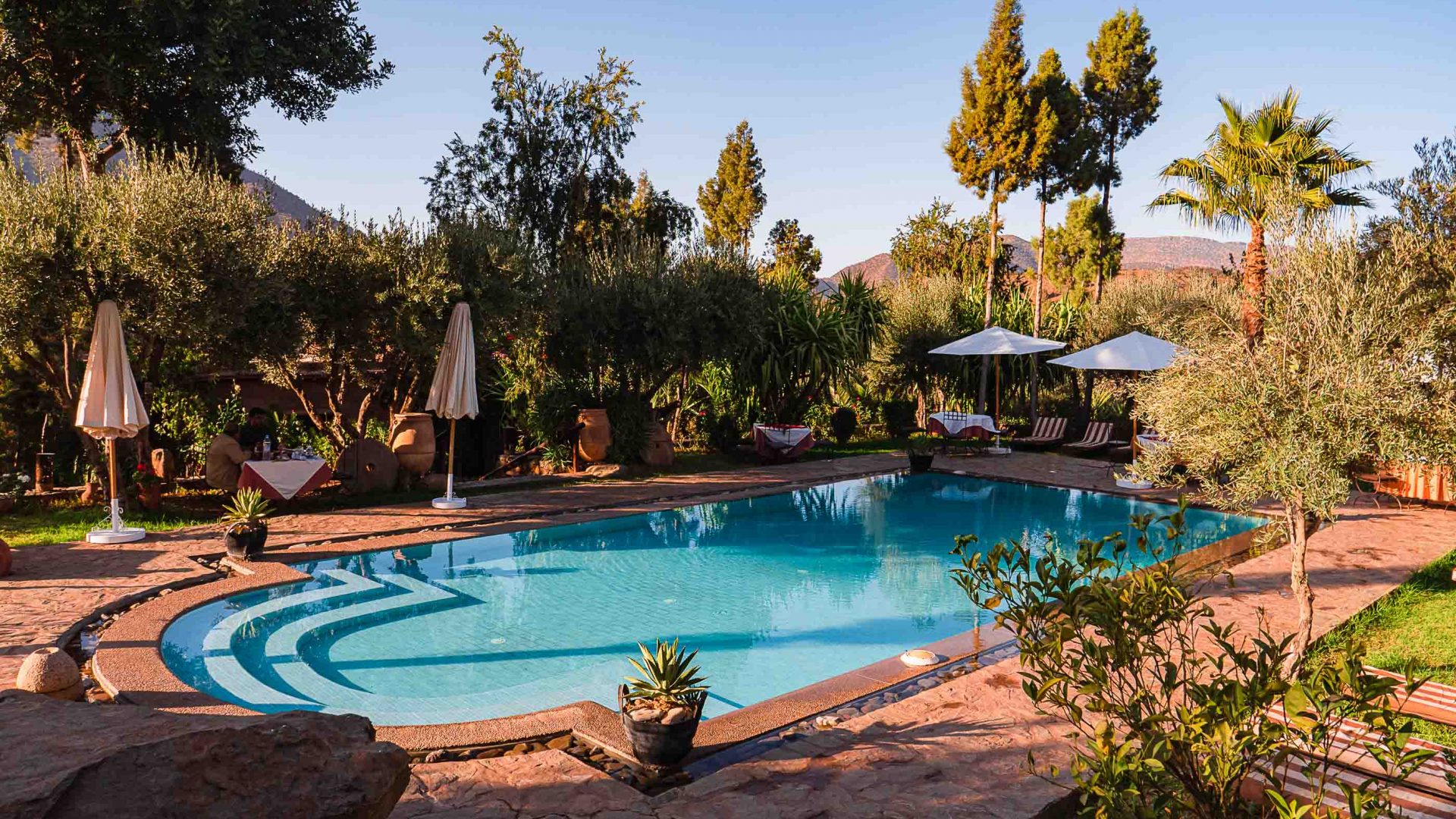 A swimming pool in picturesque surrounds.