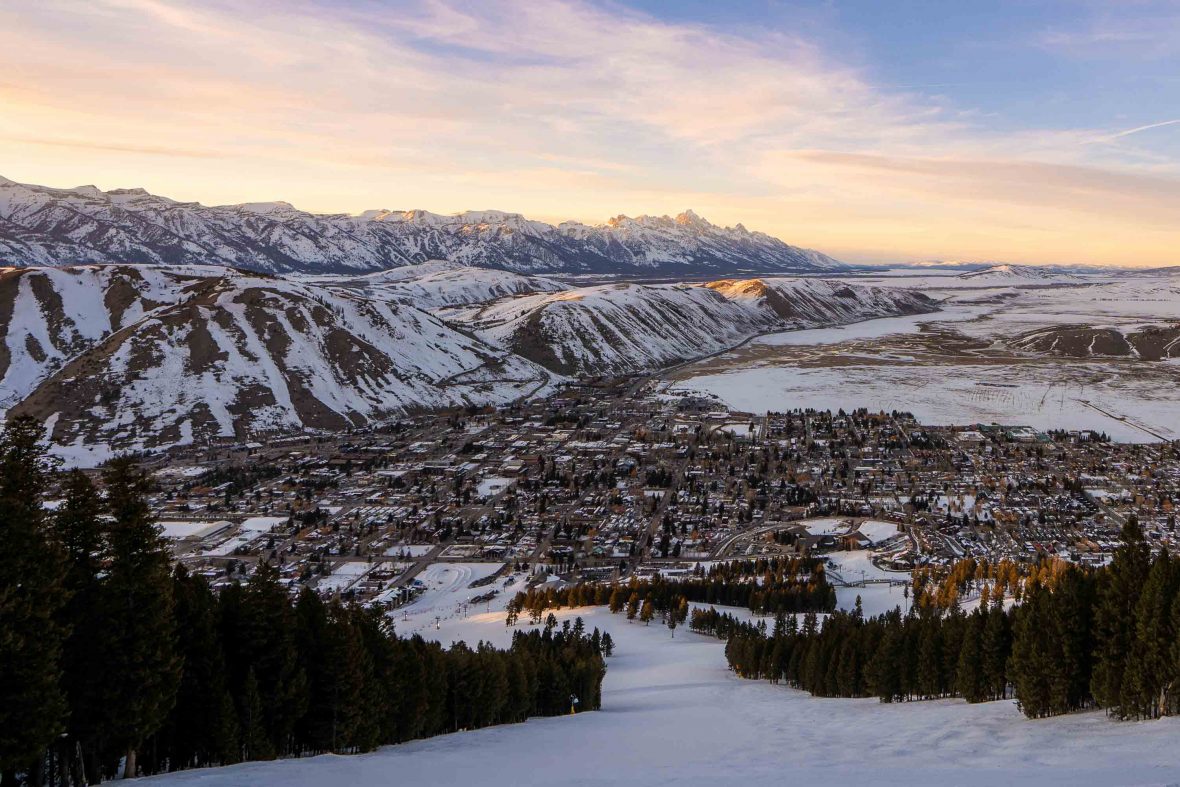 Looking down over the town and ski mountains around Jackson Hole when the sky is getting dark.