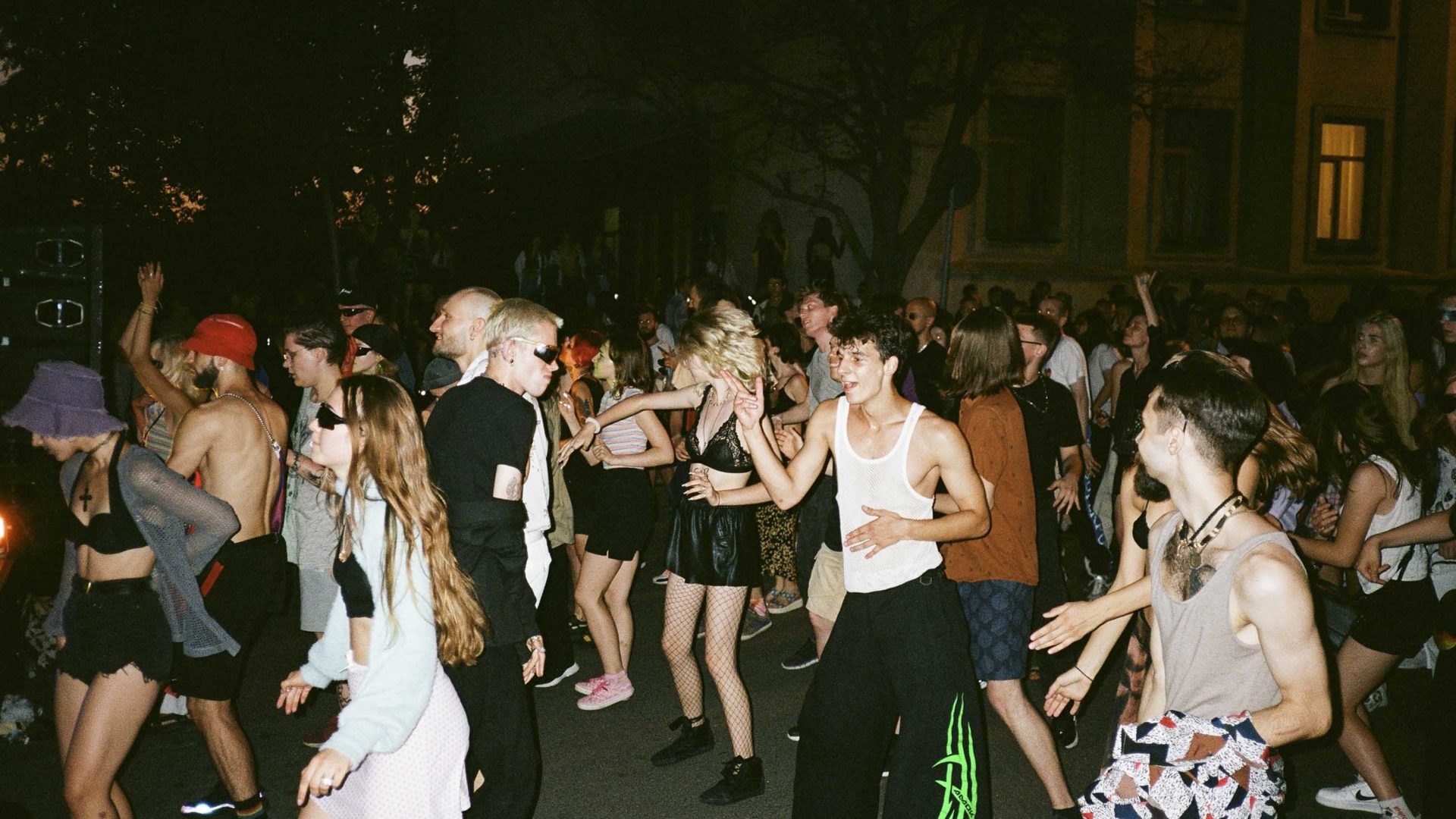 LGBTQ people dancing at a Pride event.