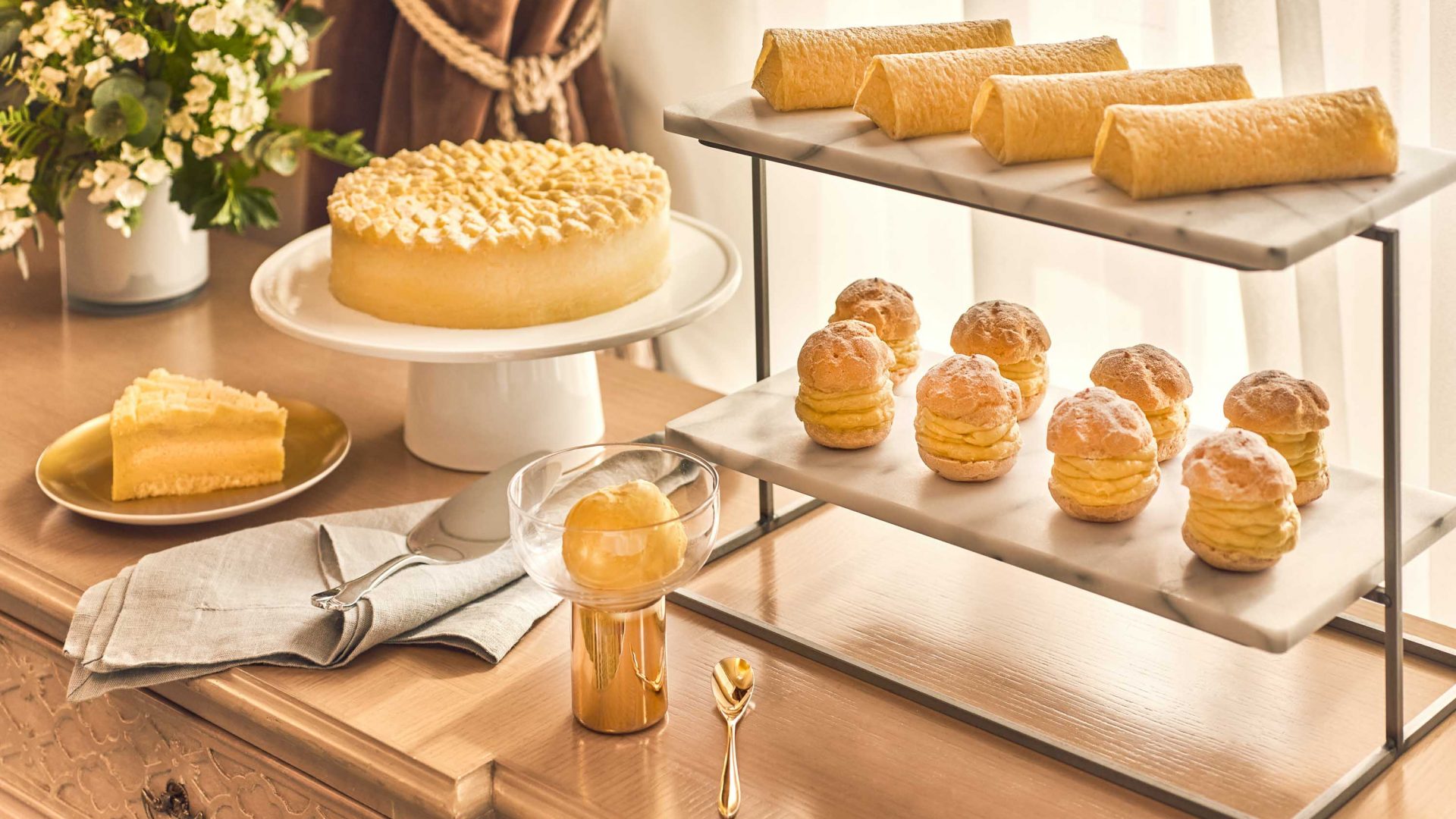 A cabinet displaying several durian pastries.