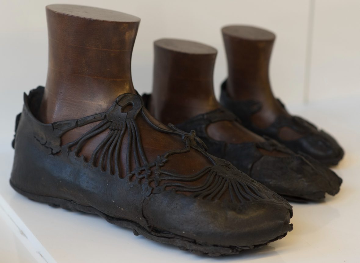 Items like these Roman black leather shoes are often found preserved in peat.