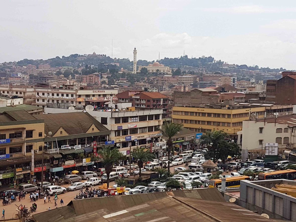 Buildings and cars in the city of Kampala.