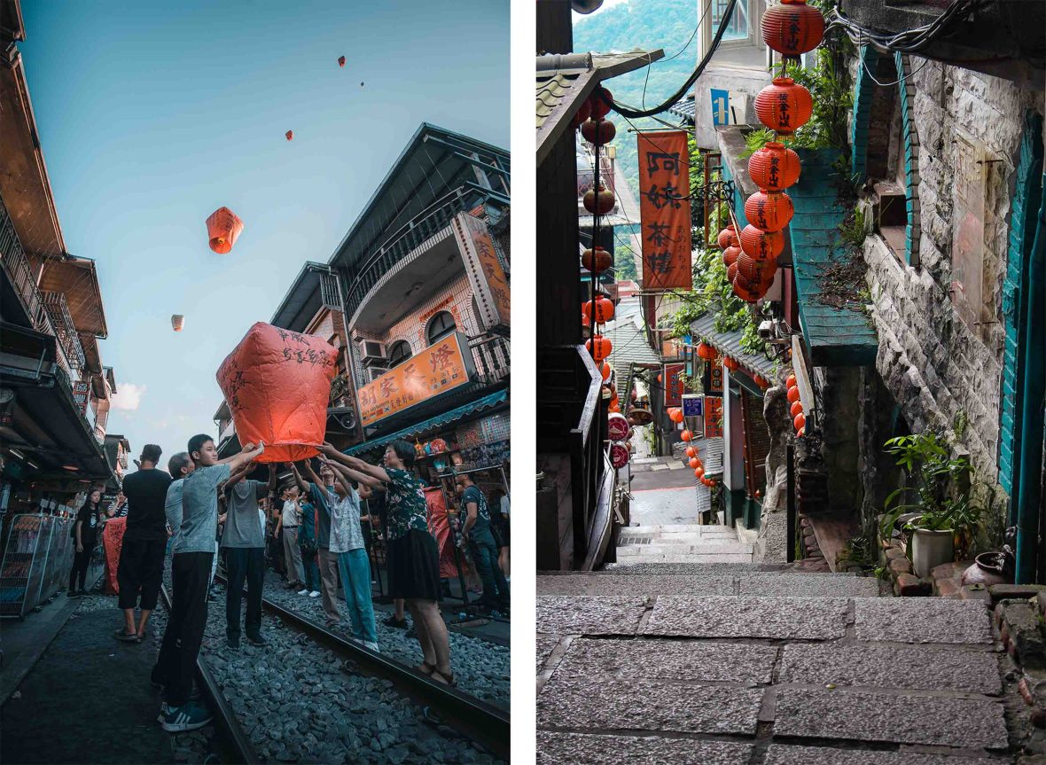 To the left people release lanterns at night in a street. To the right, paved steps leade down a narrow old street.
