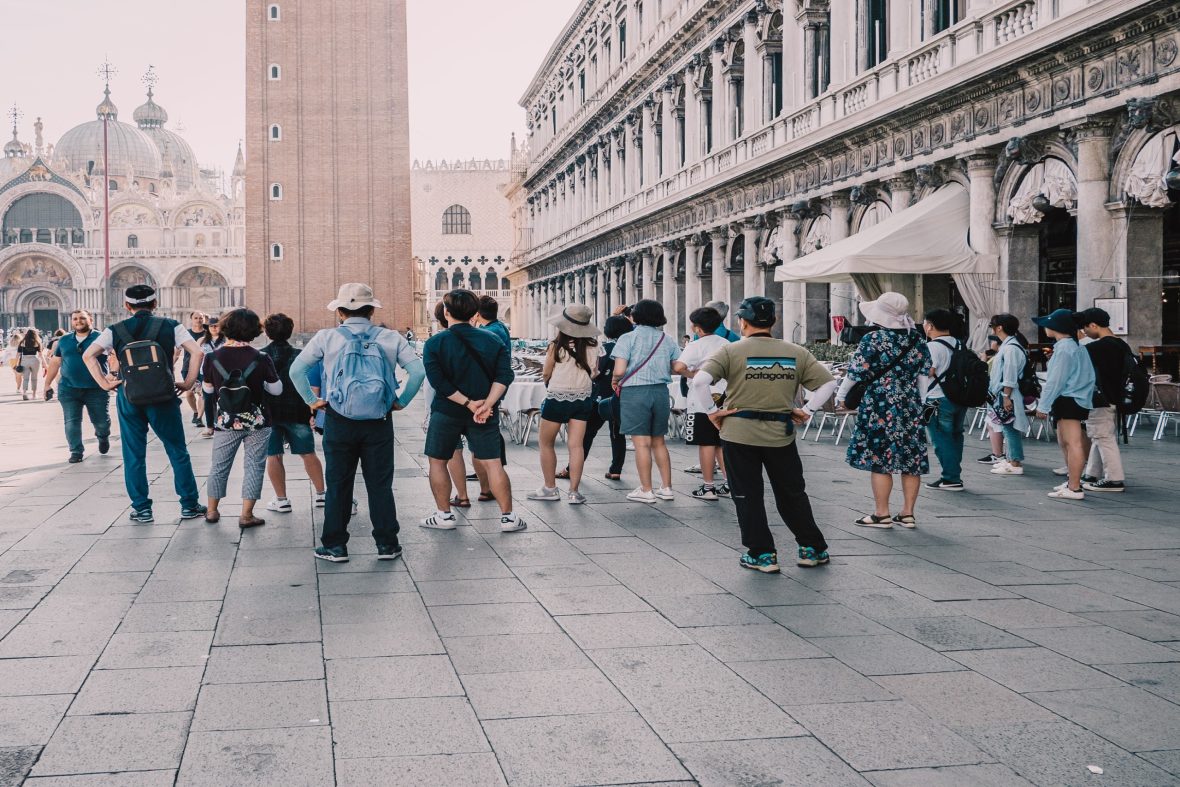 A tour group in St Mark's Square in Venice
