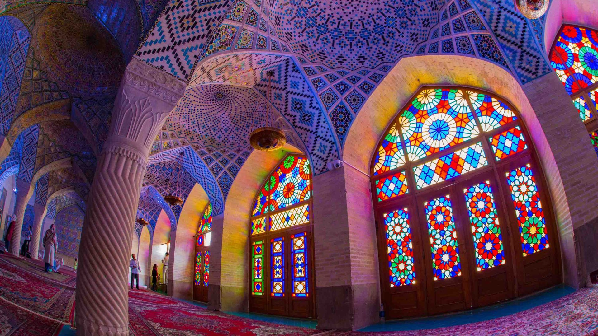 The colorful stained glass windows of a mosque.