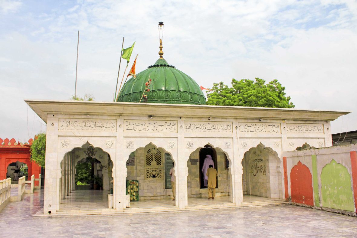 A white and green tomb.