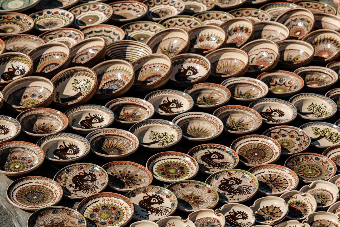 An array of souvenir ceramic plates.