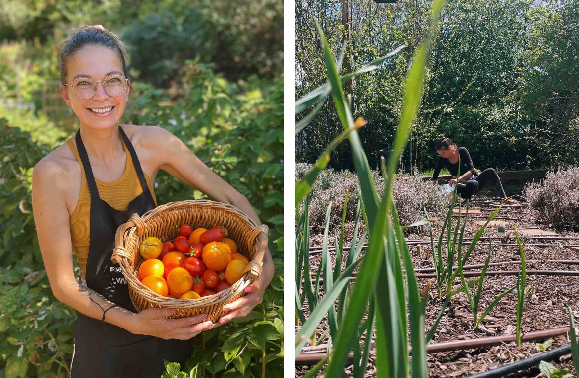 The writer Katie Boué holding a basket of tomatoes and digging in the dirt.