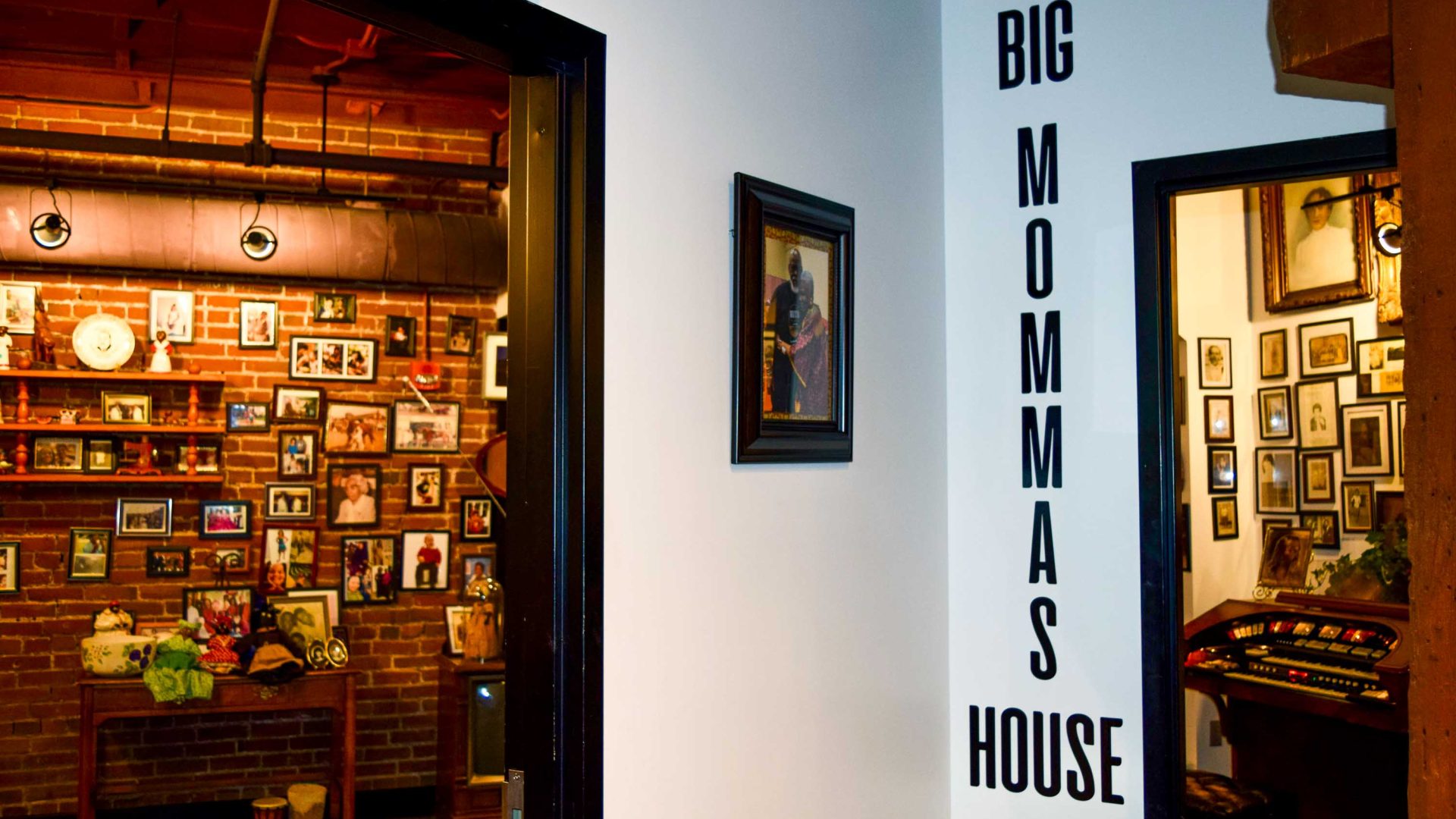 The wall says Big Mommas House and in the background you see museum pieces.