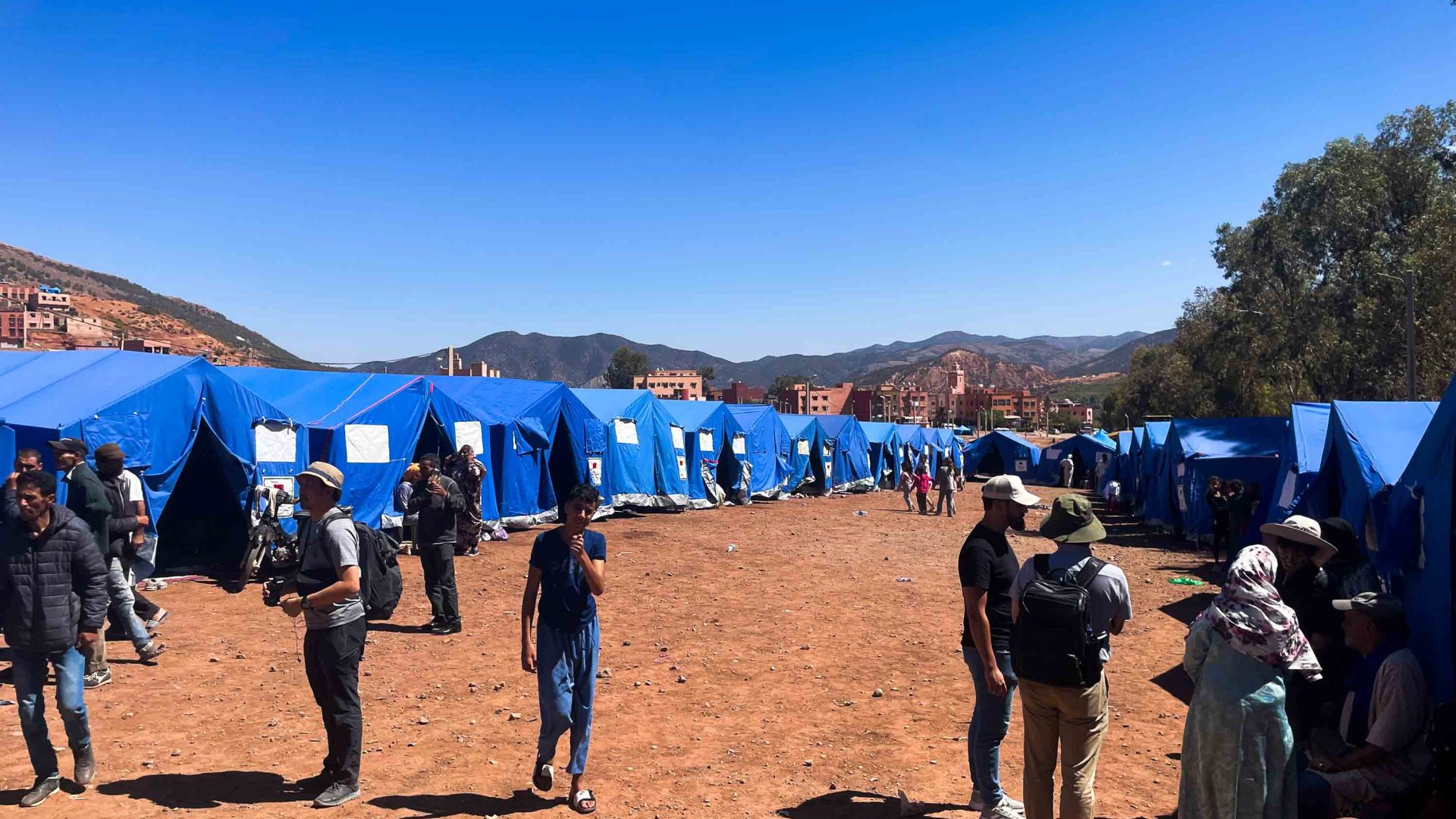 Blue makeshift camps set up to house people after the quake.