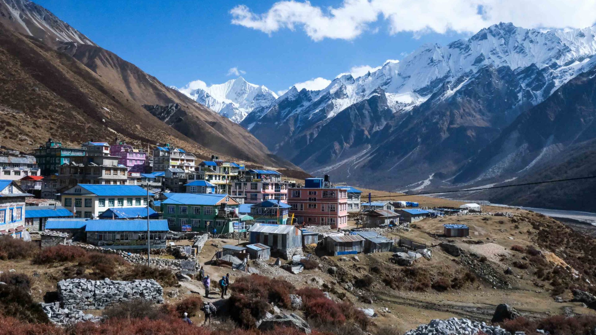 Houses in Langtang village are surrounded by mountains.