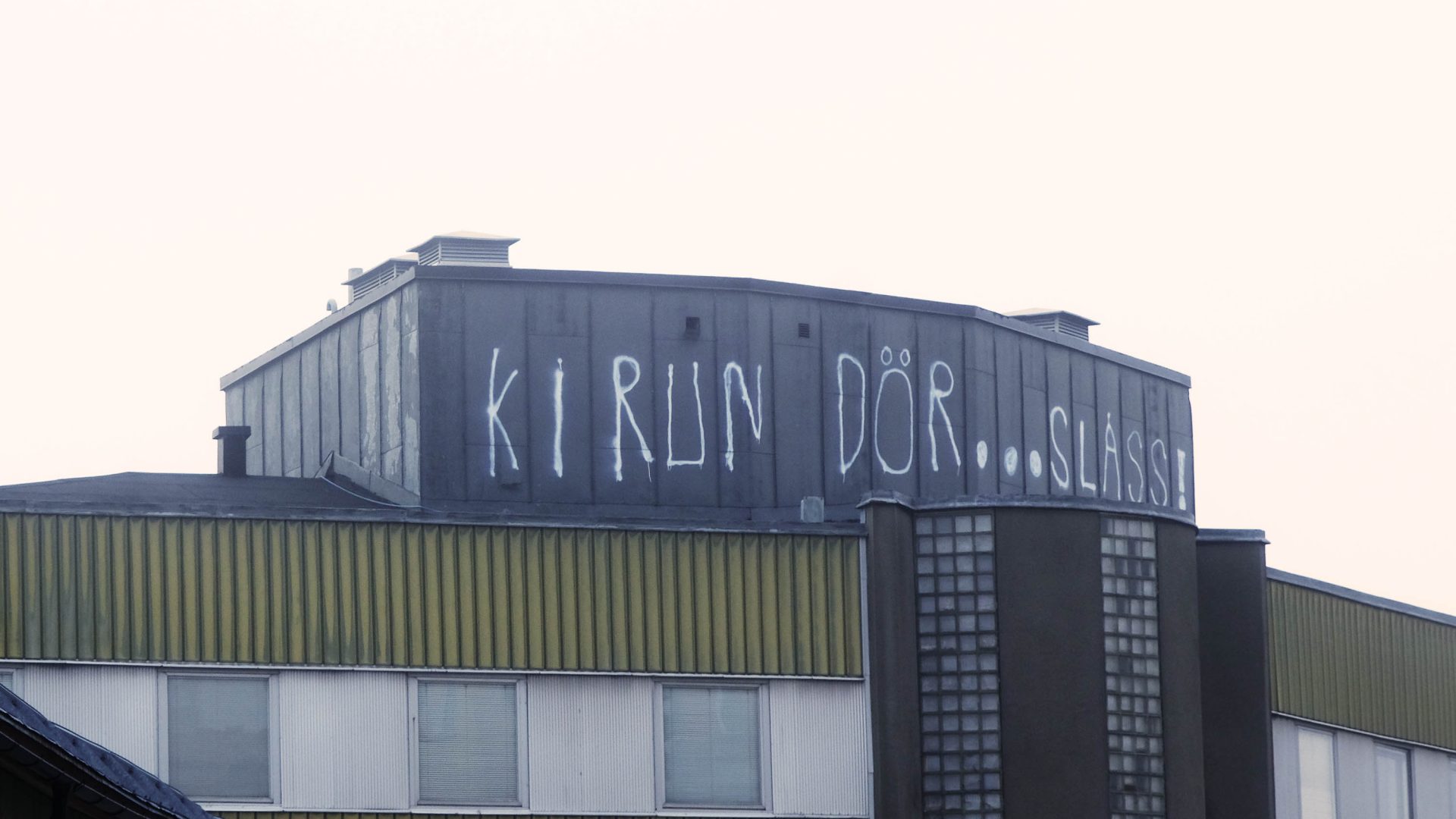 A building with the Swedish words that translate to"Kiruna is dying".