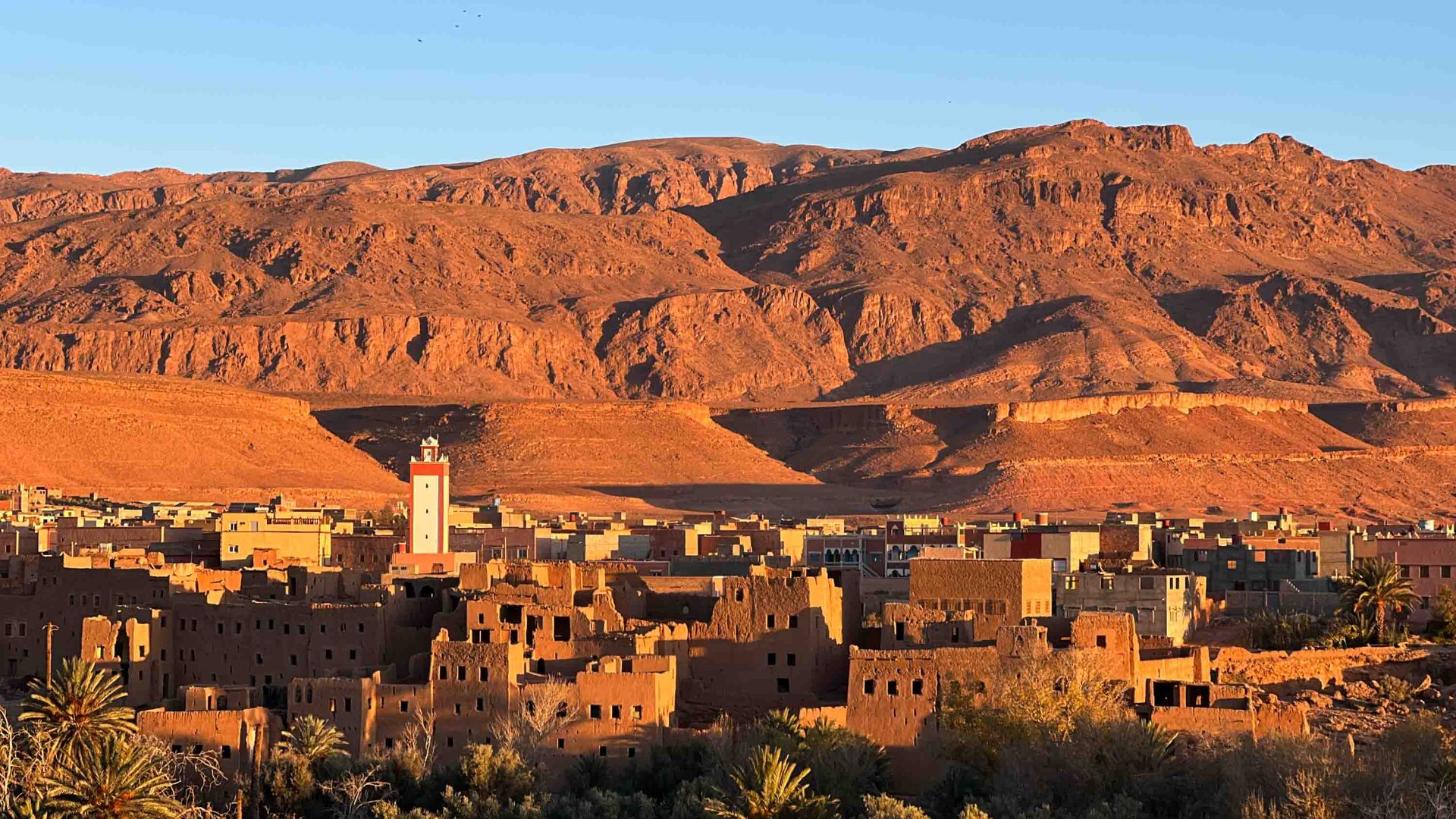 A traditional Moroccan desert town in the glow of sunset.