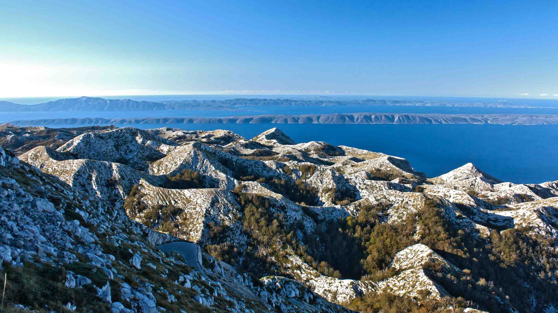 The Dinaric Alps with sea in the background.