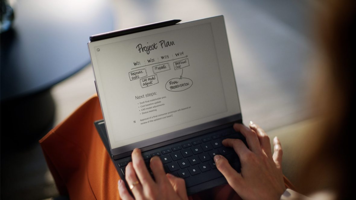An image of someone holding an e-notebook