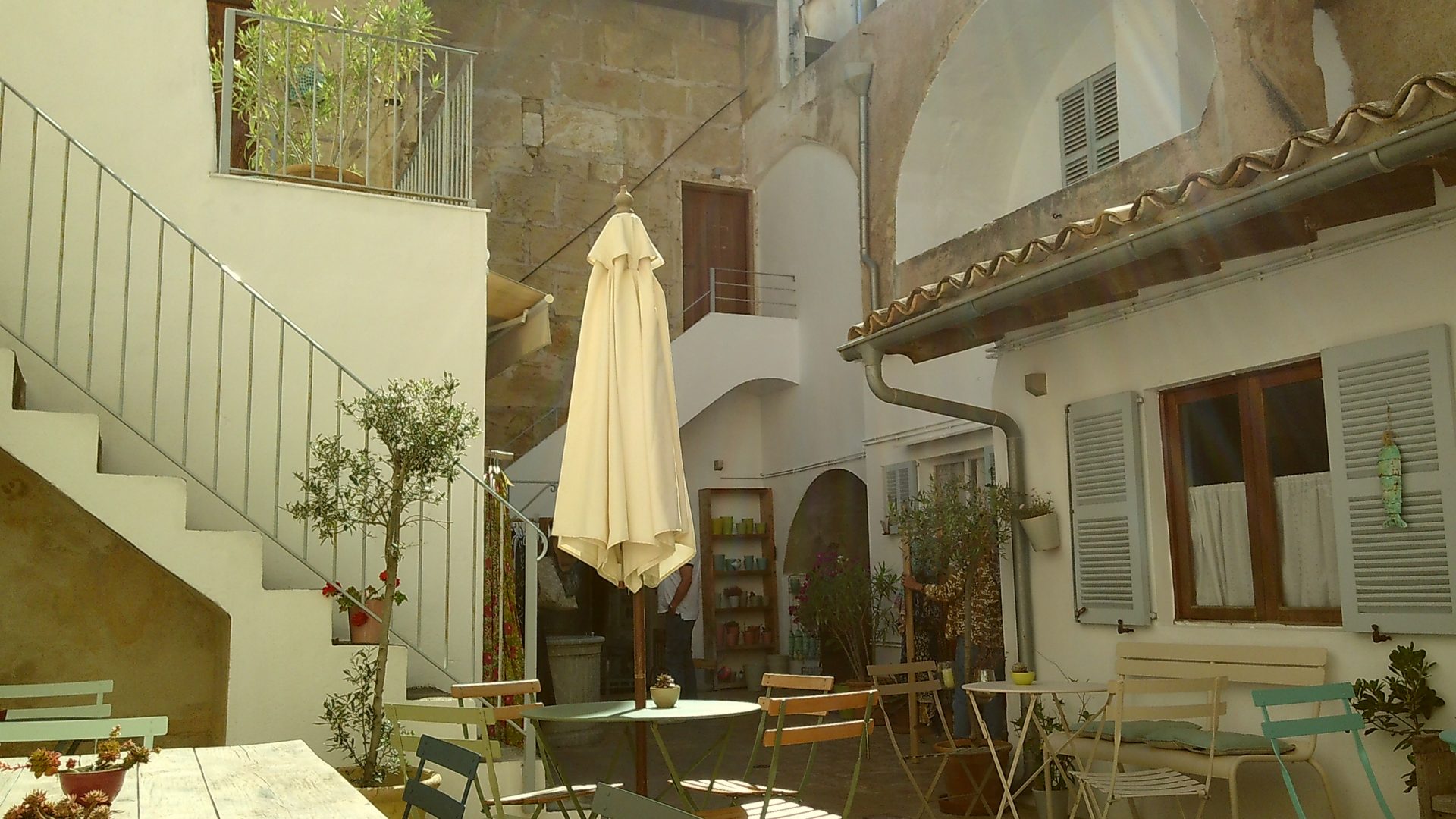 A sunny courtyard cafe in Mallorca, Spain