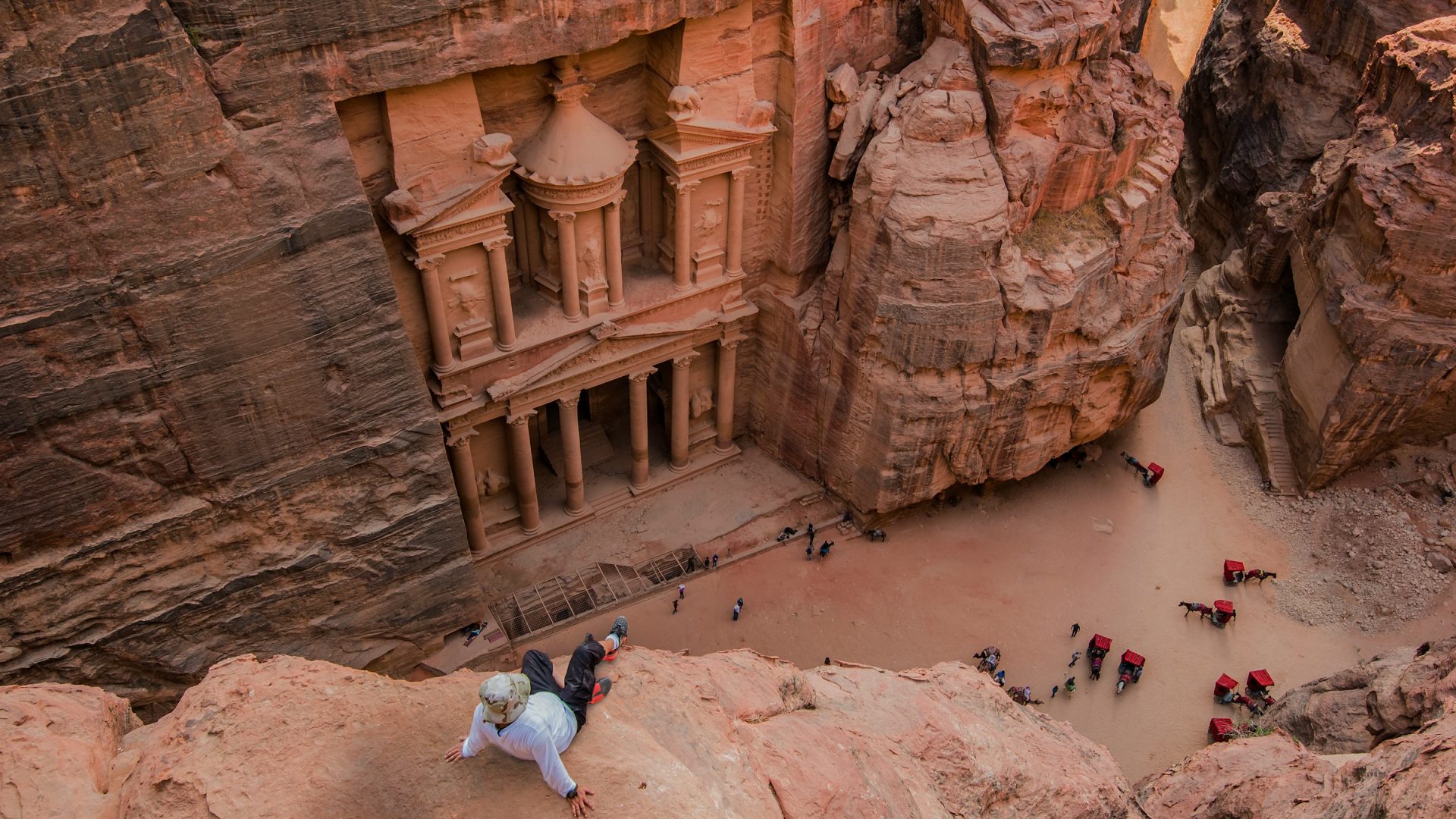 Looking down on one of Petra's archaeological sites from a rock