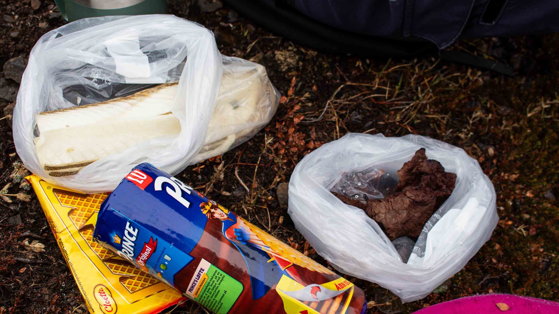 Hiking snacks, including dried narwhal, chocolate biscuits and dried halibut.