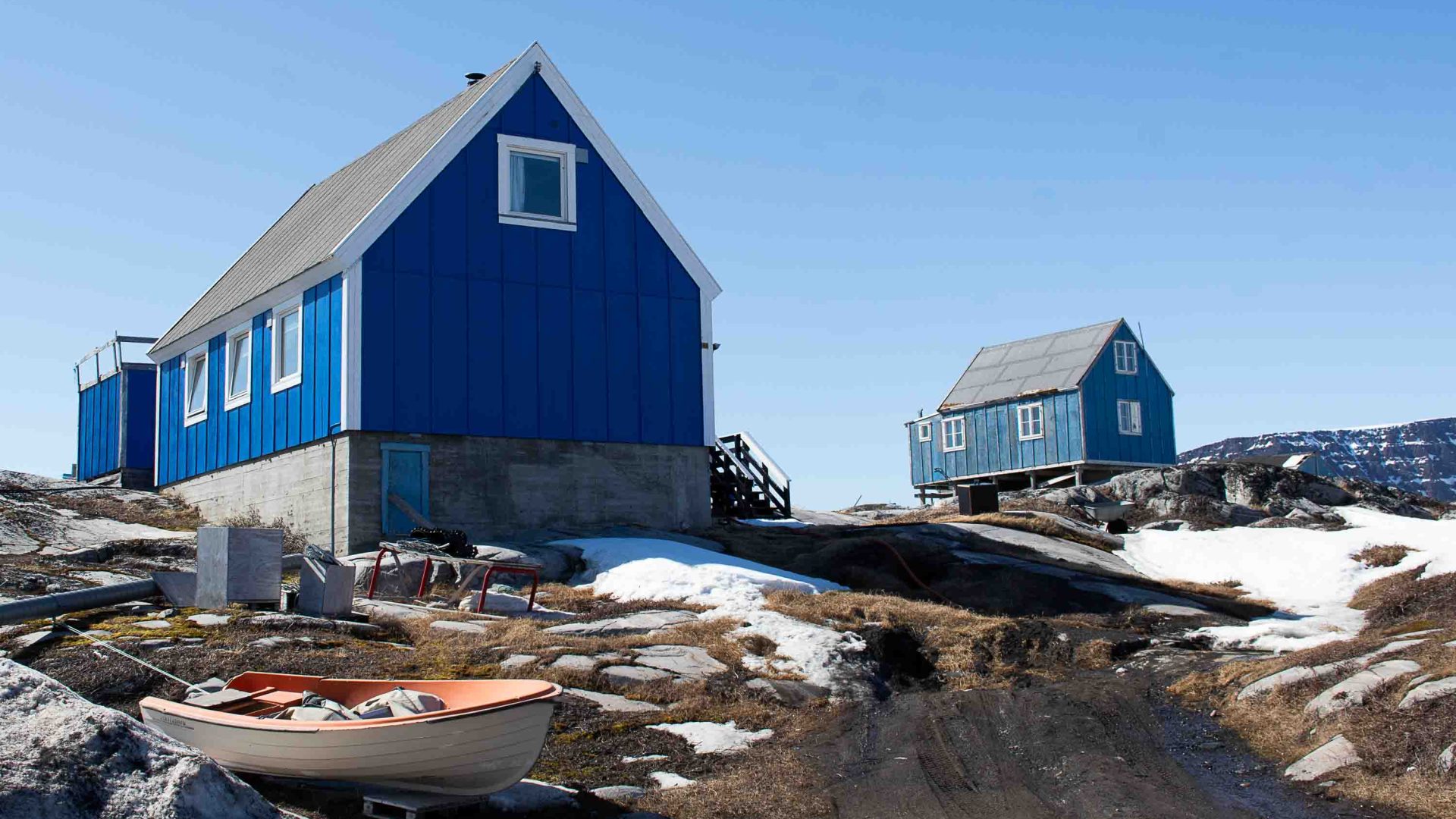 Blue houses on a hill.